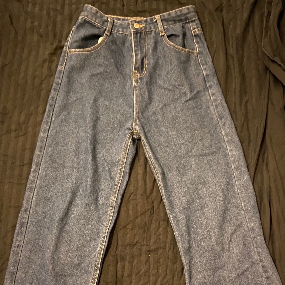 Dark blue jeans , size small , US 25-26 waist